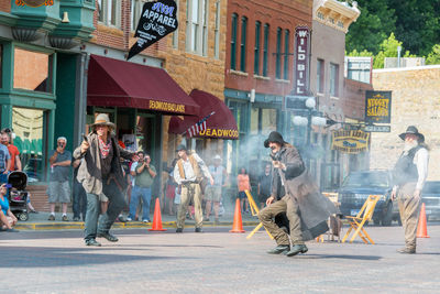 People on street in city