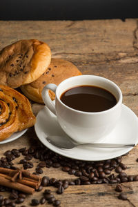 Close-up of coffee cup on table