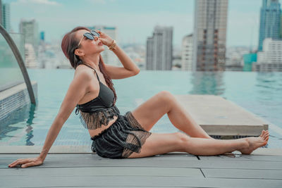 Young woman in swimming pool