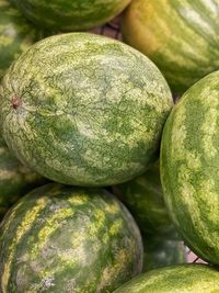 Close-up of watermelons  for sale at market stall