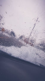 Close-up of water drops on glass