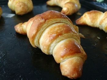 Close-up of croissants in baking sheet