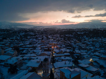 High angle view of city at sunset