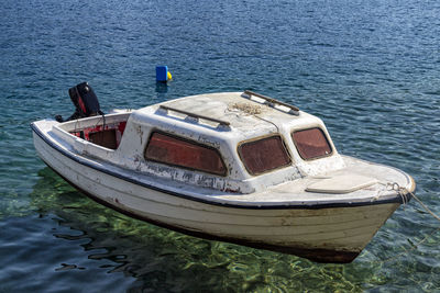 Boat moored on sea