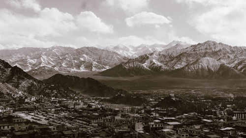 Scenic view of snowcapped mountains against sky