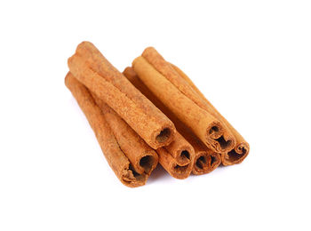 Close-up of bread against white background