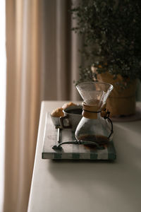 Close-up of coffee on table at home