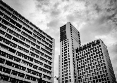 Low angle view of skyscrapers against sky