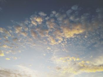 Low angle view of clouds in sky during sunset