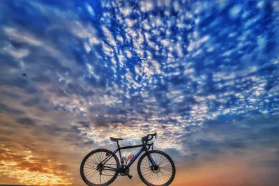 Bicycle against blue sky