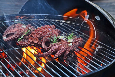 Close-up of meat on barbecue grill