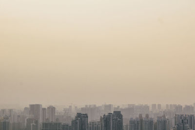 View of cityscape against clear sky