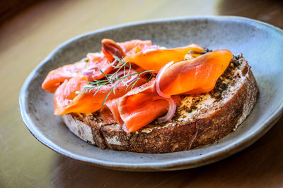 Close-up of bread in plate on table