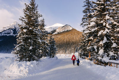 Man skiing on snow covered mountain