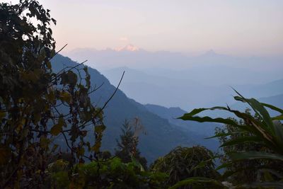 Scenic view of mountains against sky during sunset