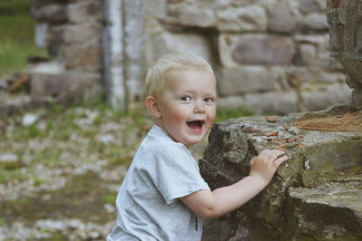 Cute boy playing outdoors