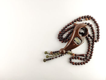 High angle view of human representation on white background