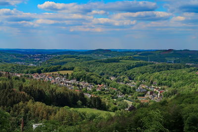 High angle view of trees on landscape against sky