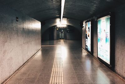 Interior of illuminated subway station