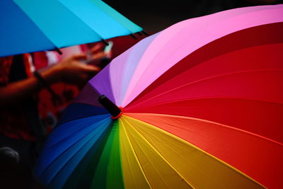 Close-up of colorful umbrella during rainy season