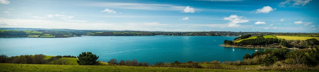 Panoramic view of bay against clear sky