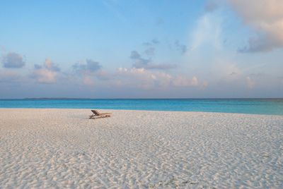 View of calm beach against the sky