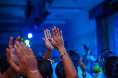 Group of people enjoying music concert