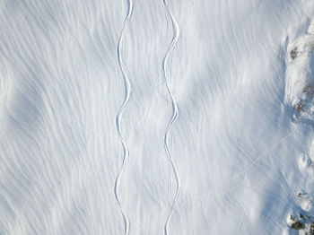 Aerial view of ski traces in backcountry