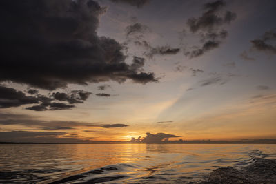 Beautiful colorful amazon sunset over the waters of negro river