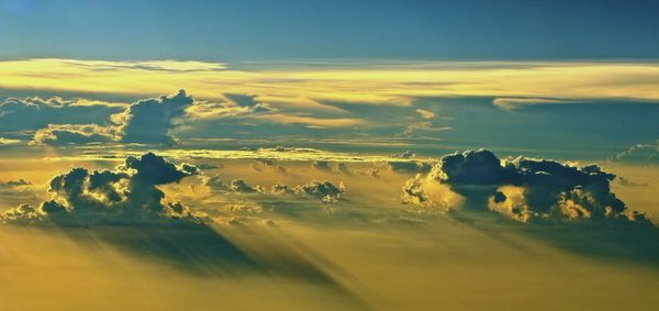 Aerial view of landscape against dramatic sky