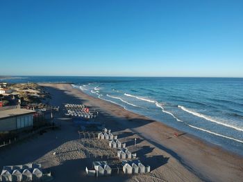 High angle view of beach against clear blue sky