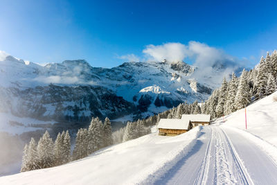 Snow covered mountains against sky