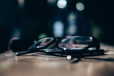 Close-up of sunglasses on table