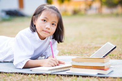 Portrait of a girl sitting on table