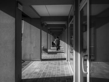 Man walking on staircase in building