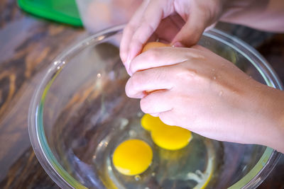 High angle view of woman preparing food