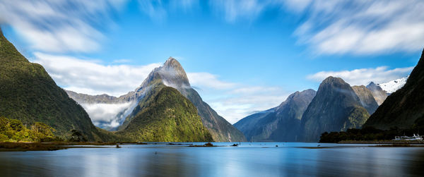 Panoramic view of lake and mountains against sky