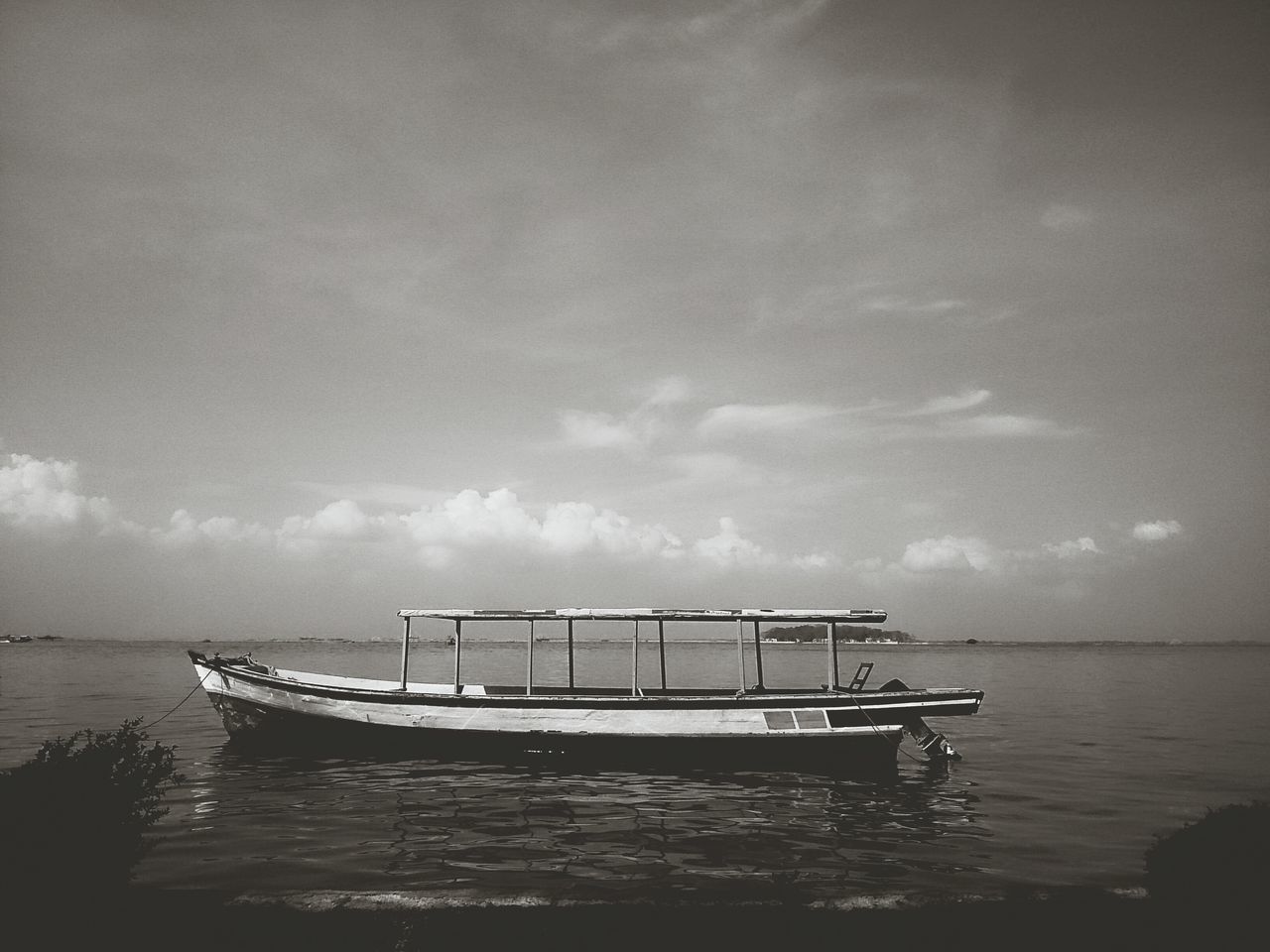 sea, water, horizon over water, nautical vessel, sky, transportation, boat, tranquil scene, mode of transport, tranquility, scenics, beauty in nature, nature, cloud - sky, waterfront, idyllic, beach, cloud, moored, outdoors