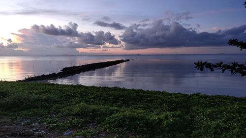 Scenic view of sea against sky during sunset