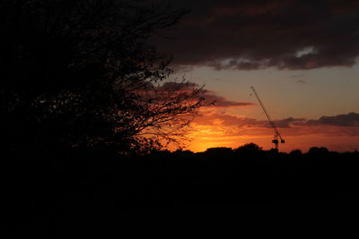 Silhouette of tree against sky during sunset