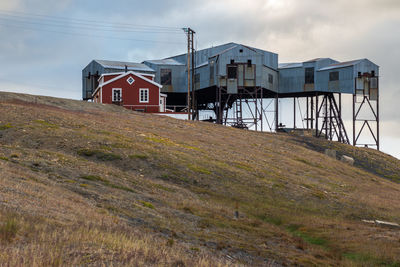 Cableway center in svalbard used to transport coal, low angle view 