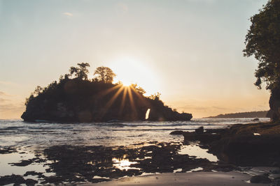 Scenic view of sea against sky during sunset