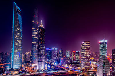 Illuminated cityscape at night