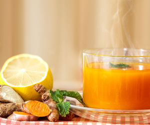 Close-up of orange juice in glass on table