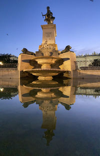 Reflection of building in lake