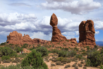 Rock formations on mountain against sky