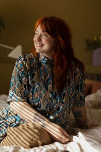 Smiling woman looking away