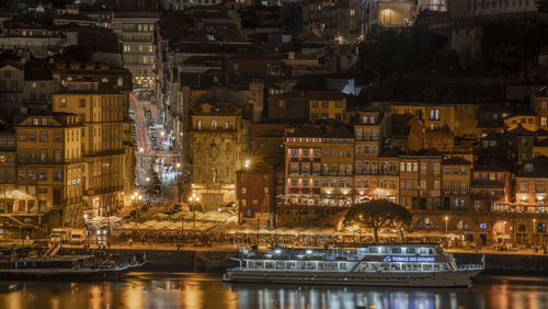 Illuminated buildings in city at night