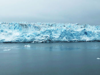 Scenic view of frozen sea against sky