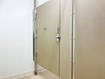 Public restroom stall door